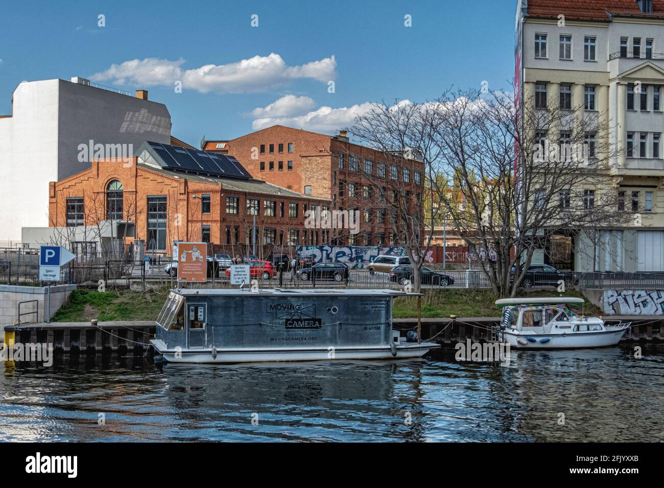 Moving Camera on Spree River,Mitte, Berlin The houseboat is a floating Camera Obscura and Polish Artist Maciej Markowicz takes pictures from the water Stock Photo
