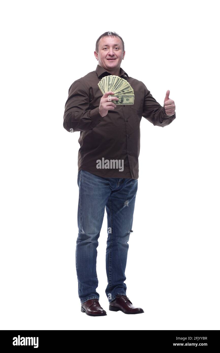 in full growth. smiling man with a fan of dollar bills Stock Photo - Alamy