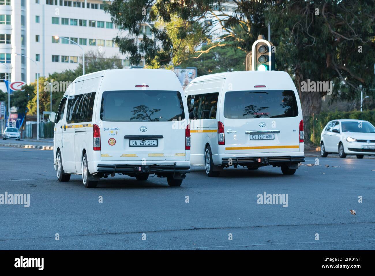 public transport, taxis in a road on a city street in Cape Town, South Africa Stock Photo