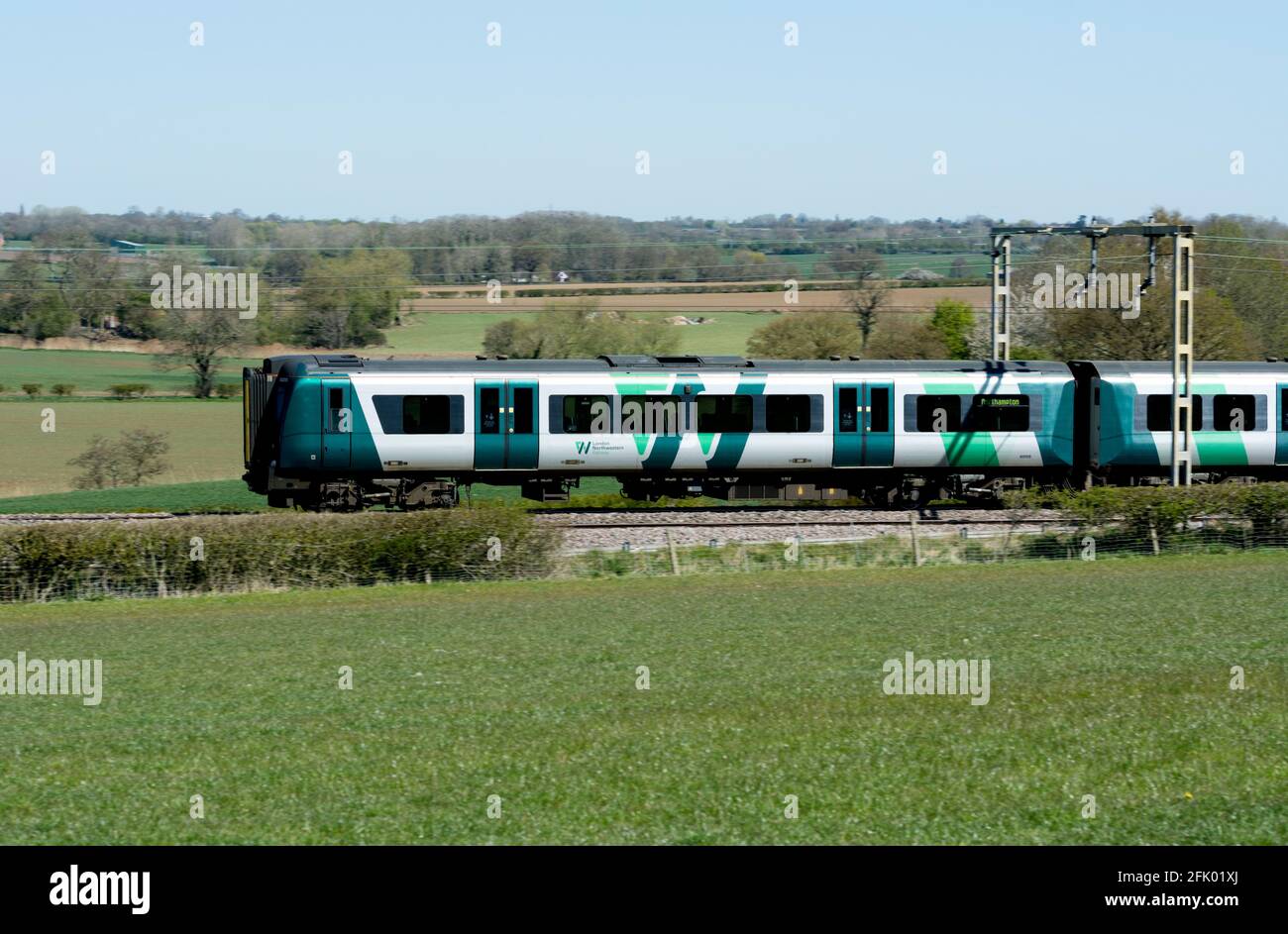 London Northwestern Railway Class 350 electric train, side view, Warwickshire, UK Stock Photo