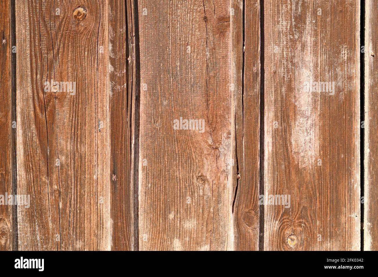 Wooden background with brown colored planks Stock Photo