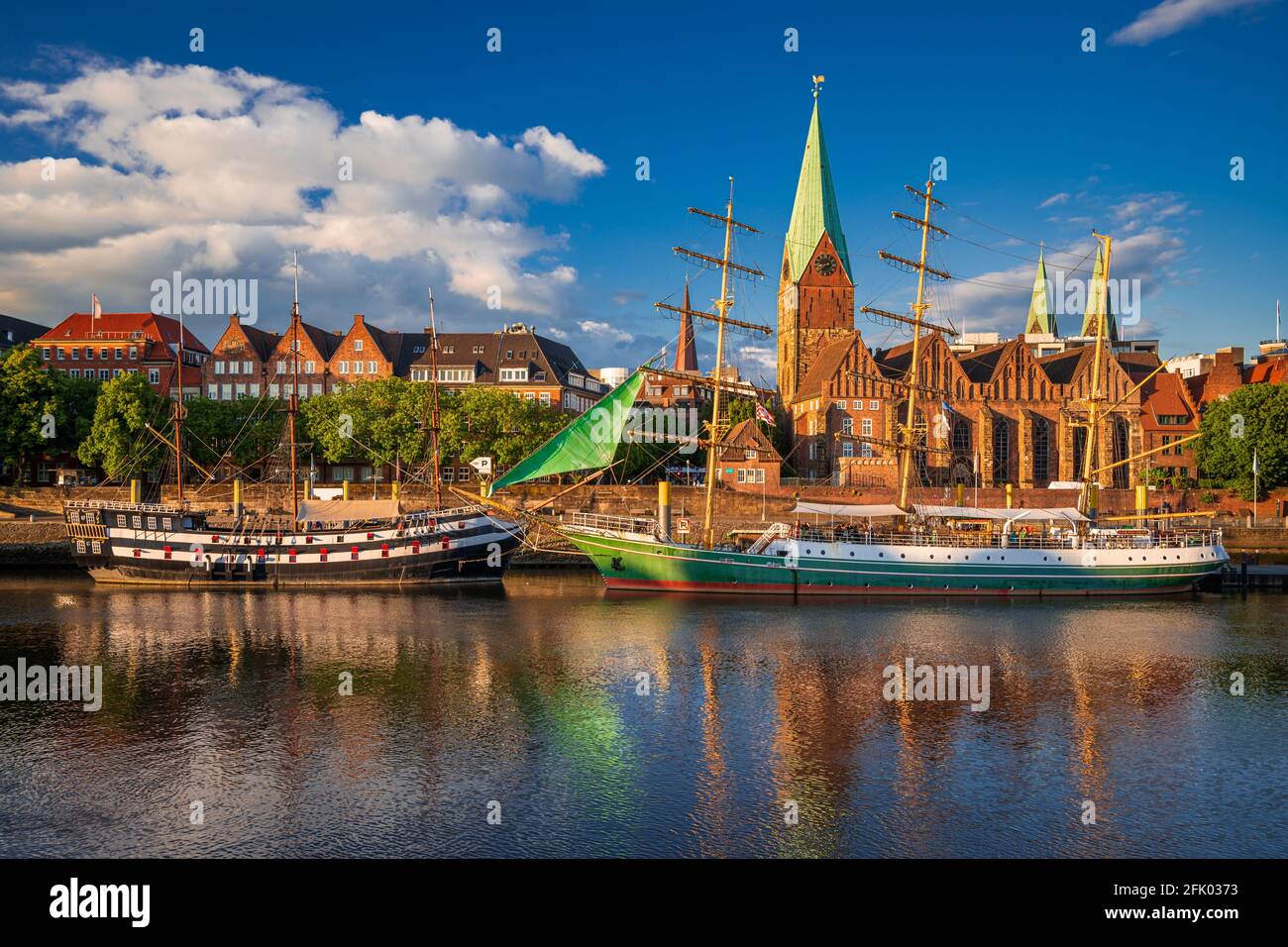 Historic town of Bremen with old sailing ships on Weser river, Germany Stock Photo