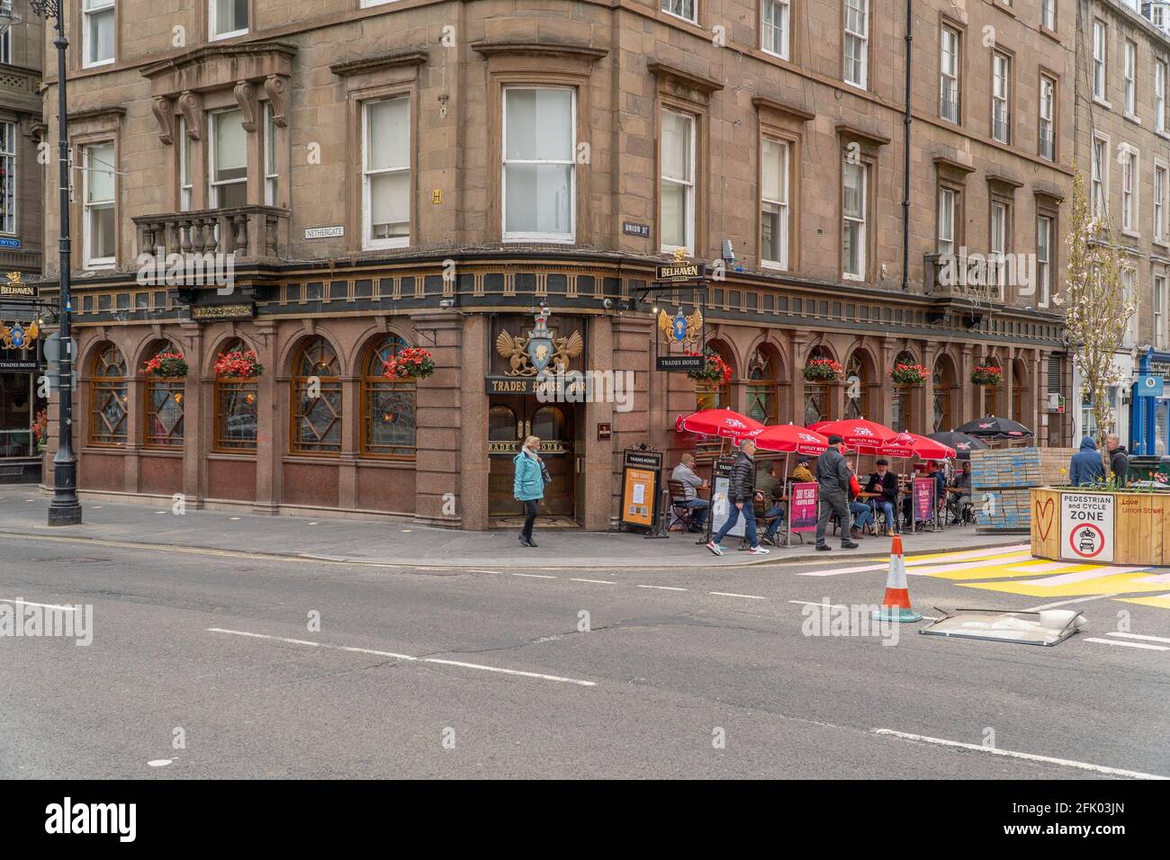 Dundee, Tayside, Scotland 26th of Apr 2021: Pubs with beer gardens open throughout Dundee city centre, as the scottish government relax the lock down restrictions, which see business opening up, and some normality returning to people lives. Stock Photo