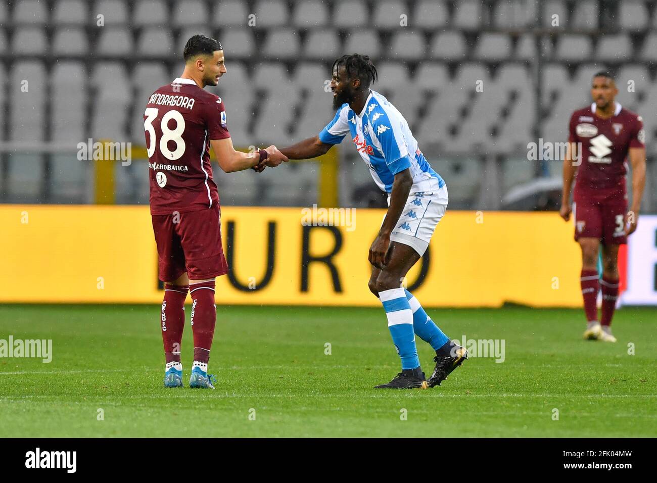 Turin, Italy. 26th Apr, 2021. Rolando Mandragora (38) of Torino FC and Tiemoué Bakayoko (5) of SSC Napoli during the Seria A match between Torino FC and SSC Napoli at Stadio Grande Torino in Turin, Italy. (Photo Credit: Gonzales Photo/Alamy Live News Stock Photo