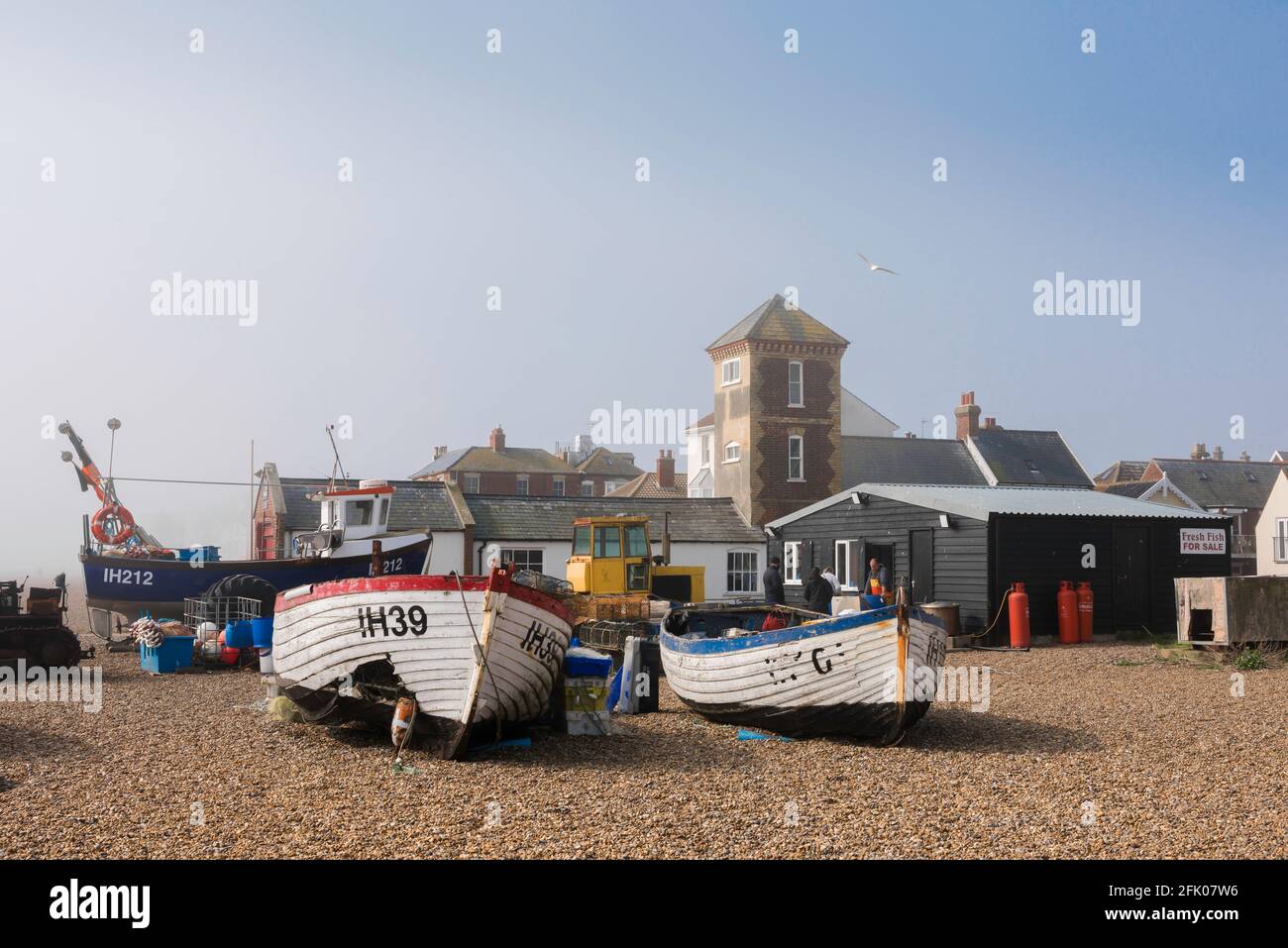 Aldeburgh beach Suffolk, view at dawn of the shingle beach and fishing boats at Aldeburgh in Suffolk, England, UK. Stock Photo