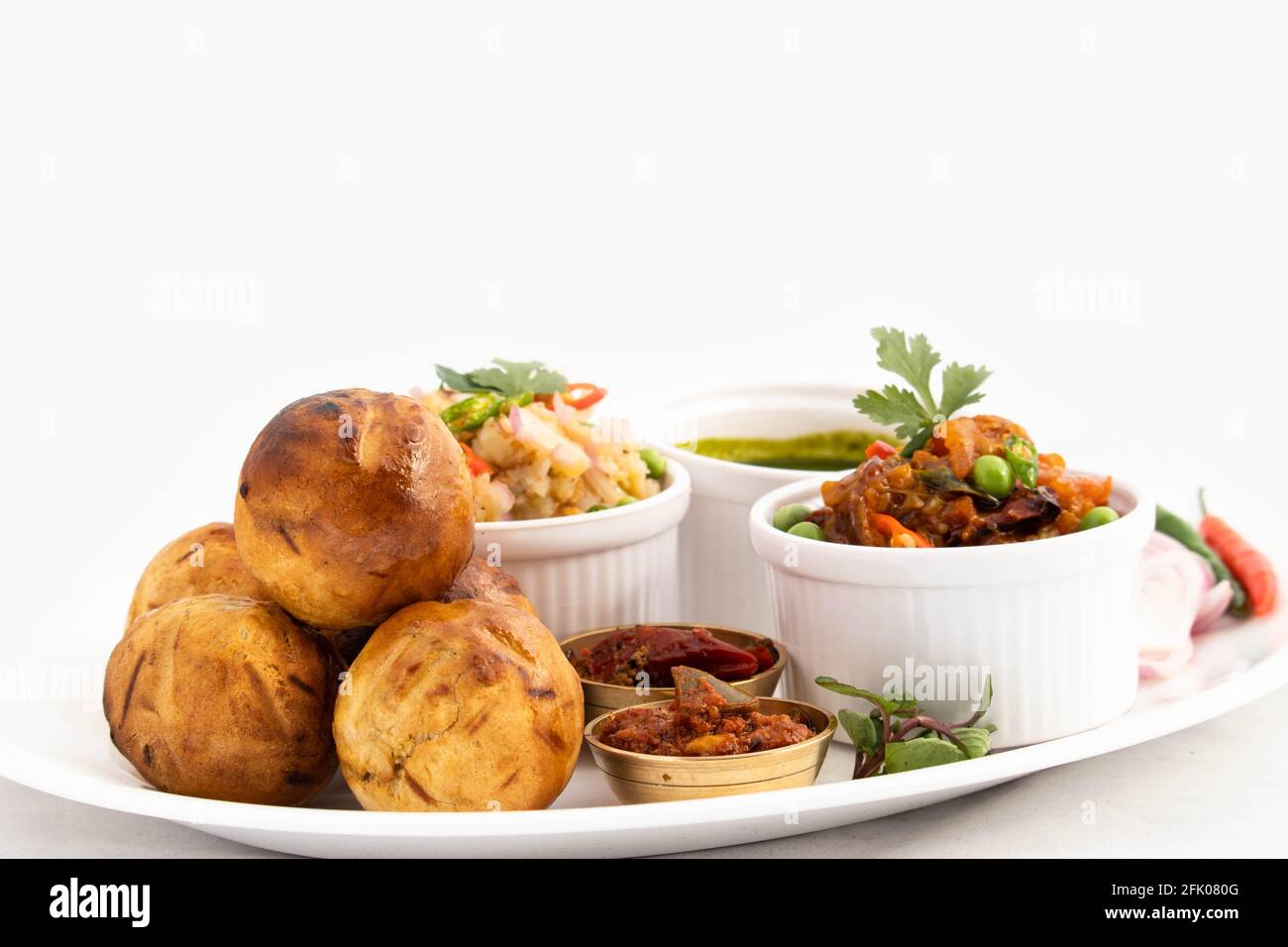 Litti Or Liti Chokha Round Wheat Dough Drenched In Desi Ghee And