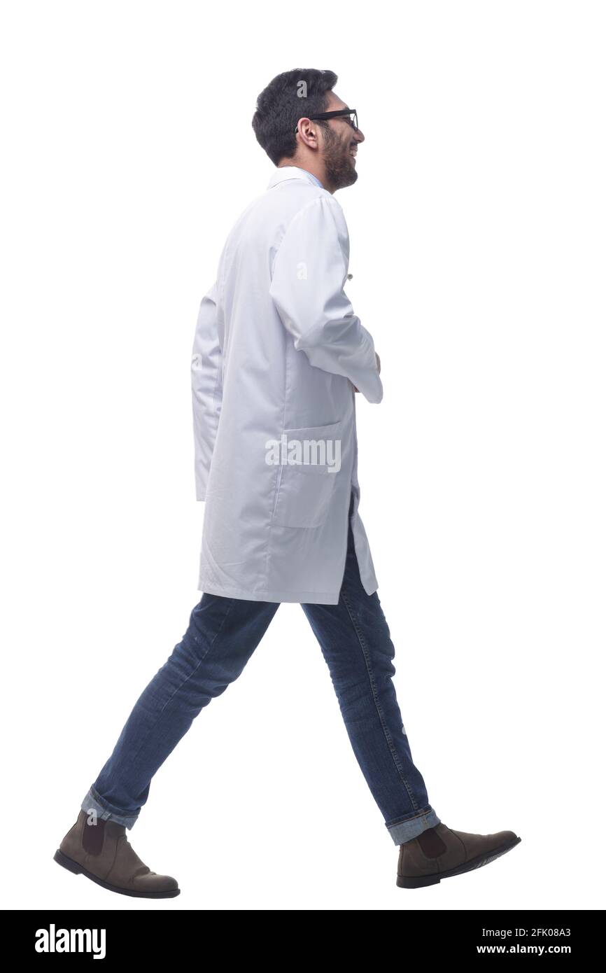 happy doctor with a stethoscope striding forward Stock Photo - Alamy