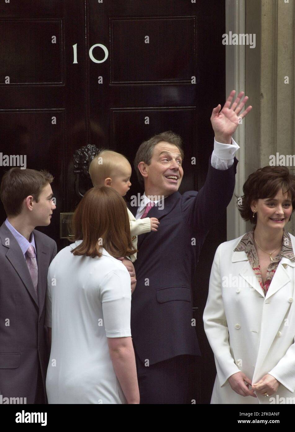 Prime Minister Tony Blair  with his family Nicholas (L), Kathryn (2L) infant Leo, Cherie (2R)  and Euan (R) stand outside No10 Downing Street June 8 2001.Tony  Blair swept to his second landslide election win Stock Photo