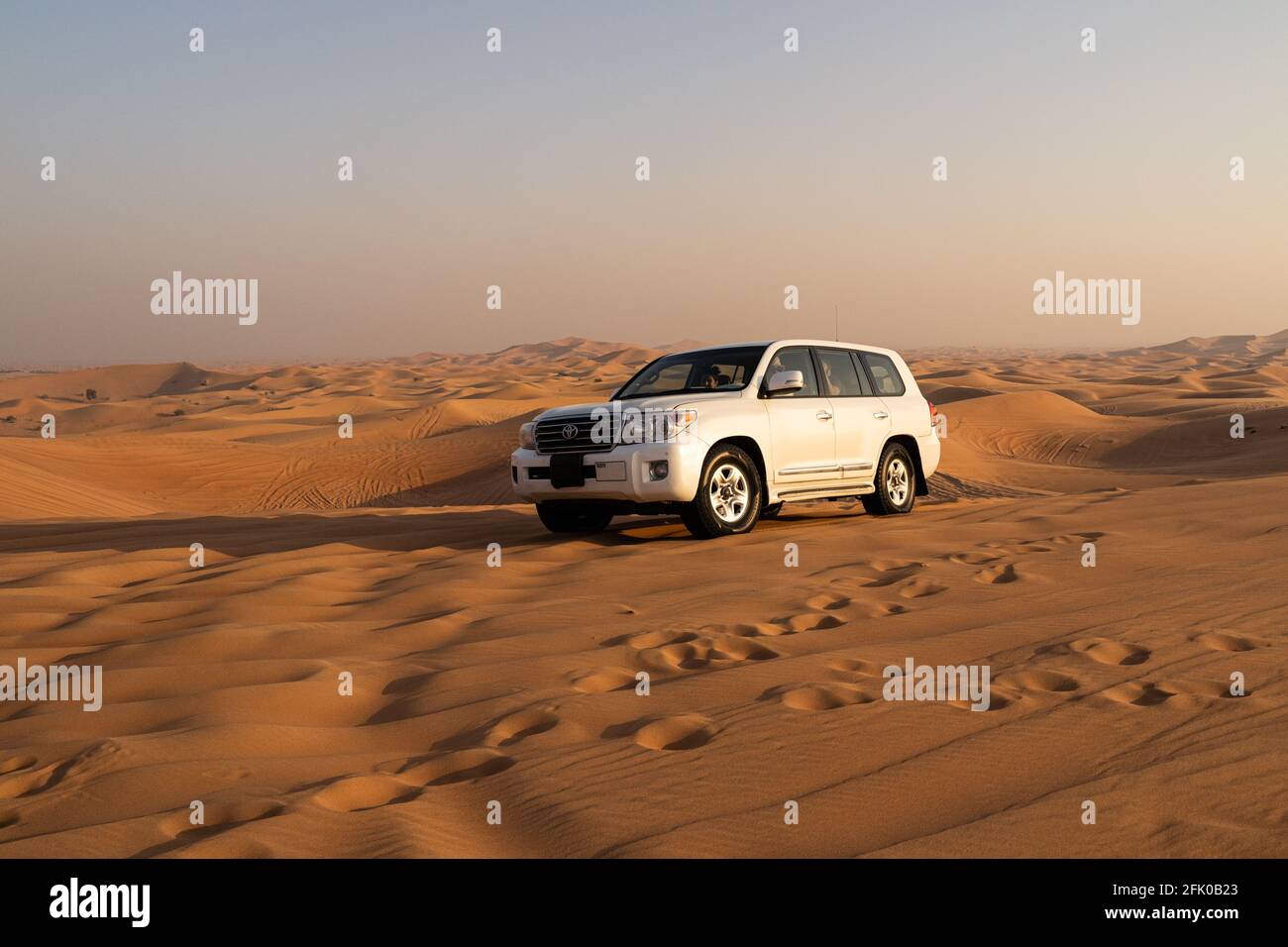 Desert safari tour in UAE. Four wheel drive desert safari car driving