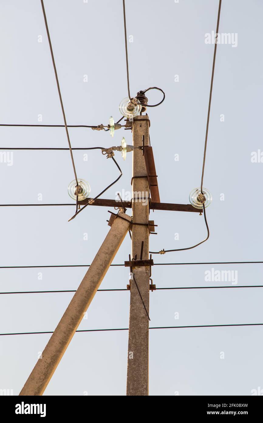 Electricity concept, concrete pole with high voltage wires on
