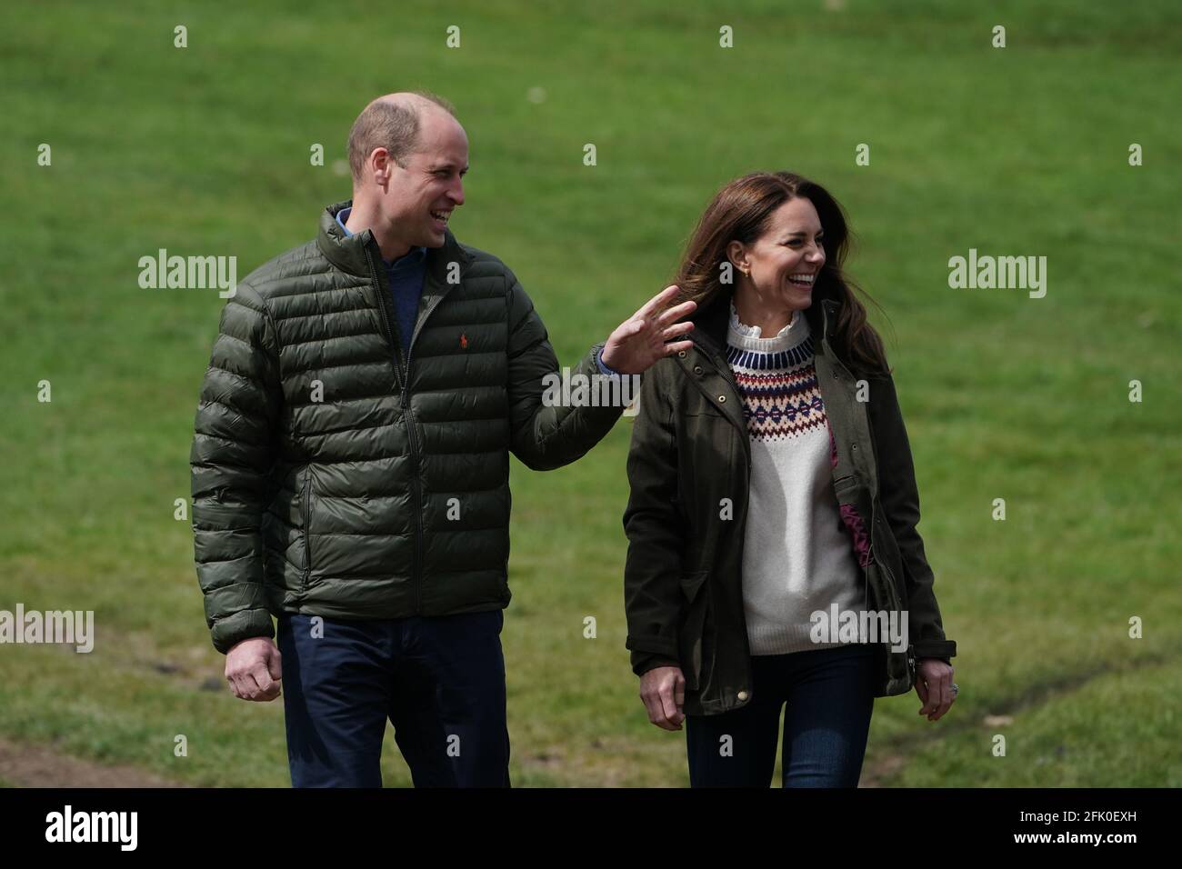 The Duke and Duchess of Cambridge walk together during their visit to