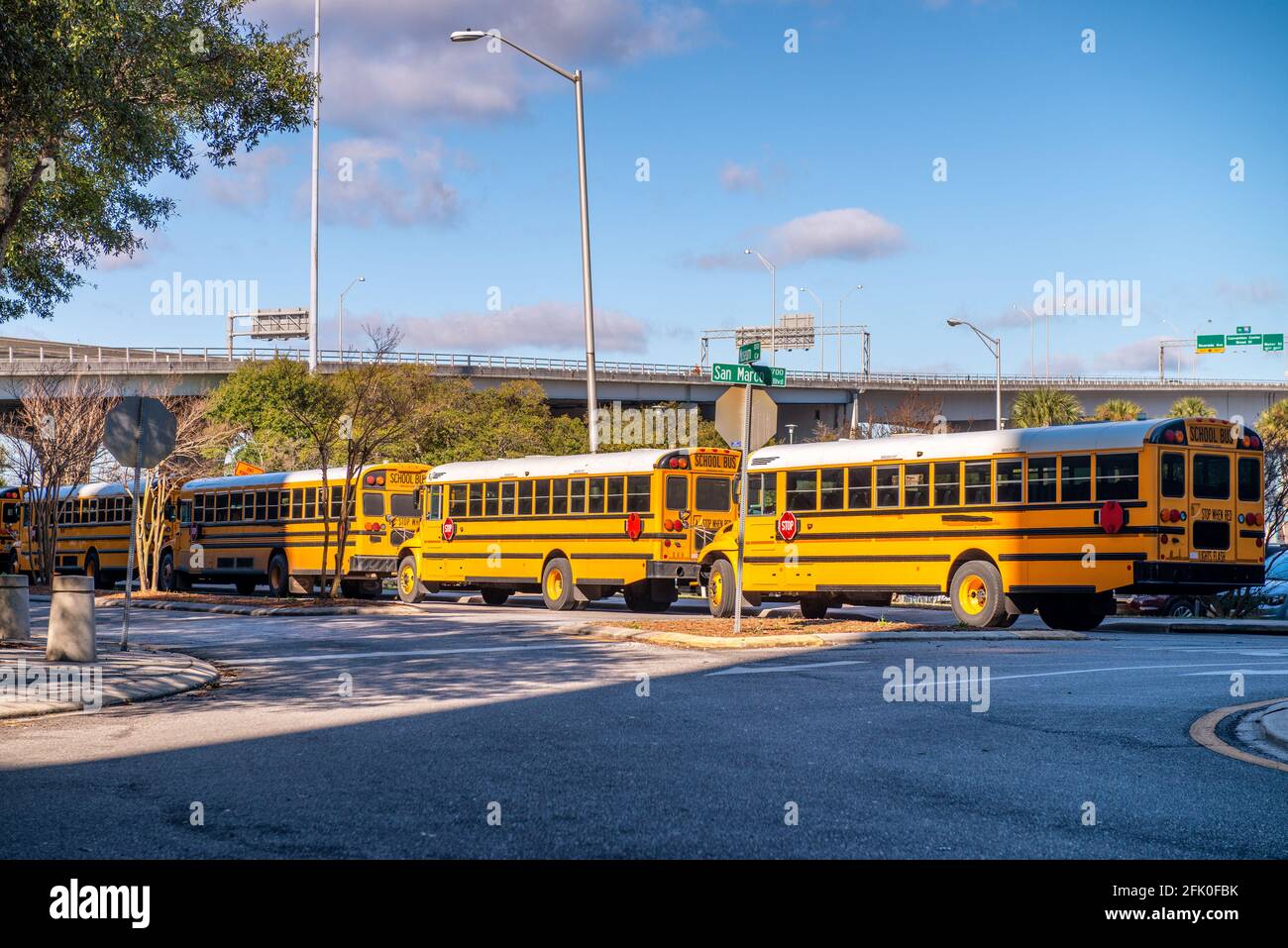 School buses line hi-res stock photography and images - Alamy