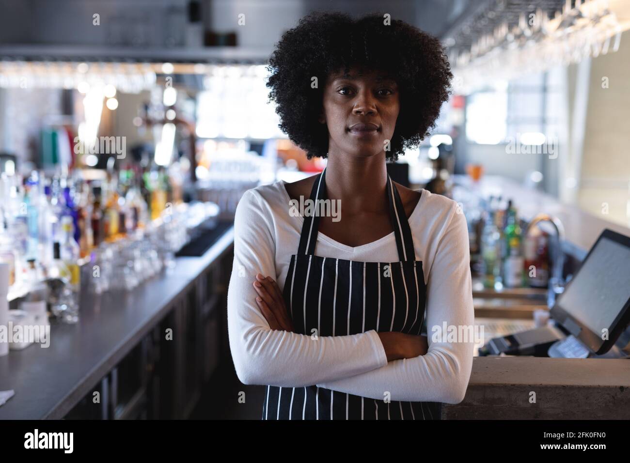 Barista wearing apron hi-res stock photography and images - Alamy