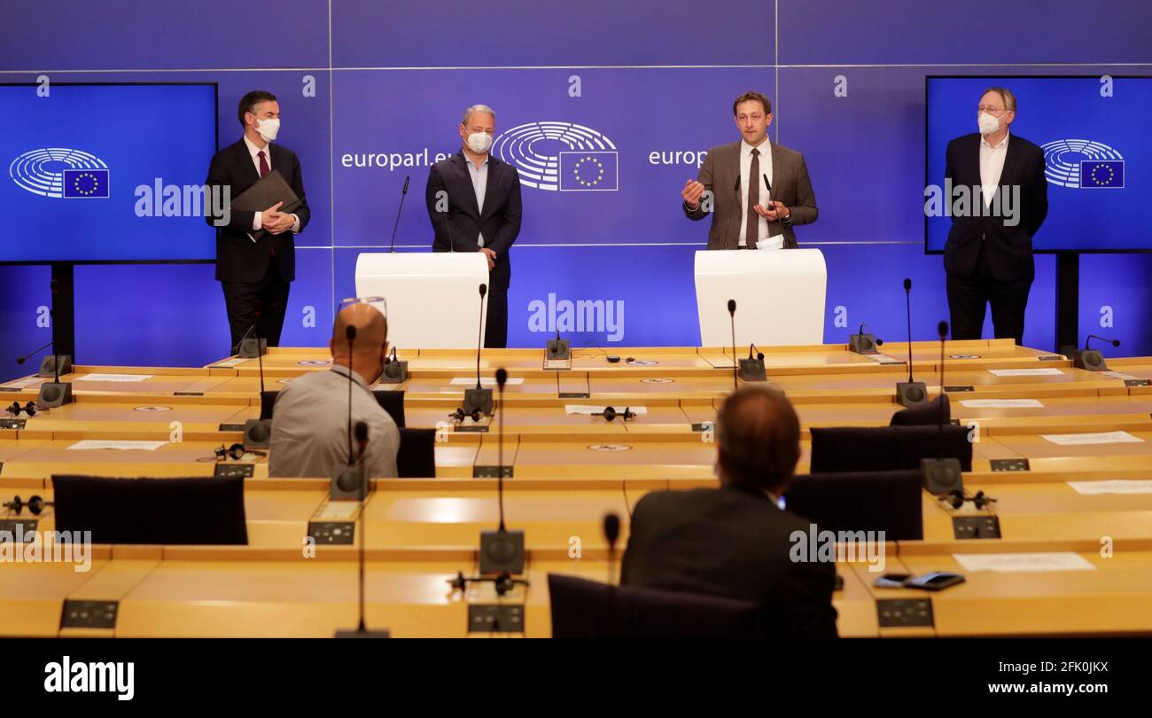 Members of European Parliament David Mcallister, Chair of the Committee on Foreign Affair, Andreas Schieder, Christophe Hansen and Bernd Lange, Chair of the Committee on International Trade, give a news conference following the debate on EU-UK trade and cooperation agreement during the second day of a plenary session at the European Parliament, in Brussels, Belgium, 27 April, 2021. Olivier Hoslet/Pool via REUTERS Stock Photo