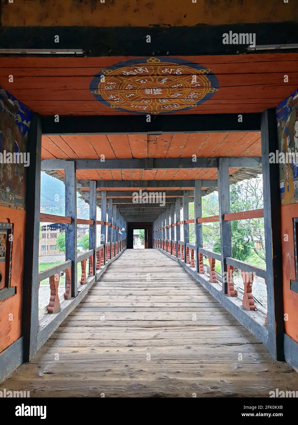 An ancient Bhutanese Bridge made of wood with a unique structure and ...