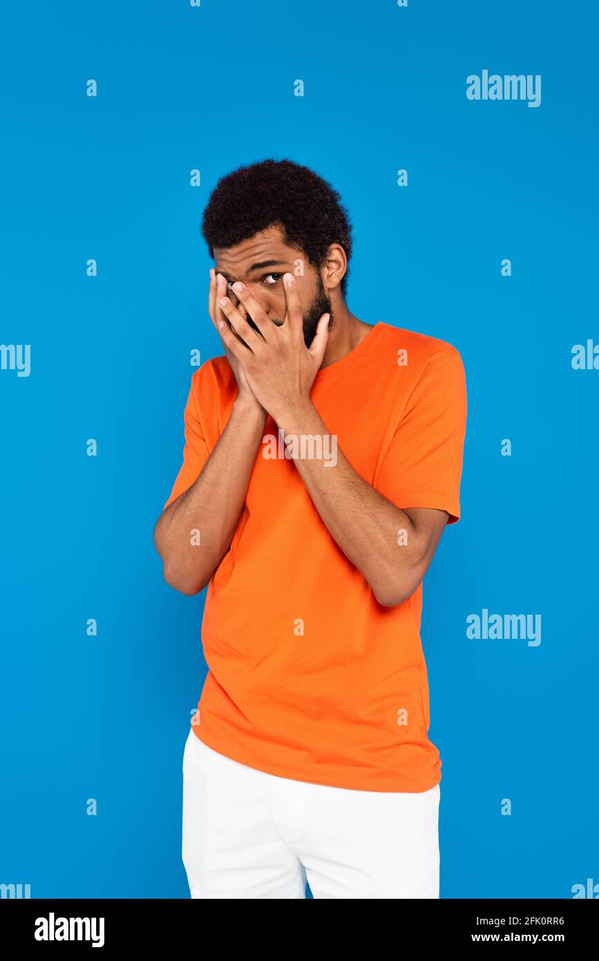 Man scared hands face hi-res stock photography and images - Alamy