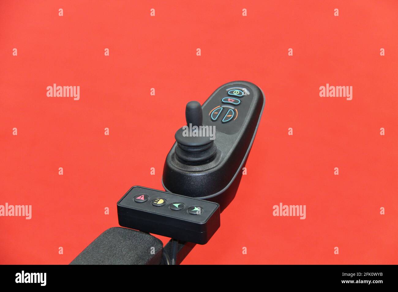 Joystick and Buttons of an Electric Mobility Chair. Stock Photo