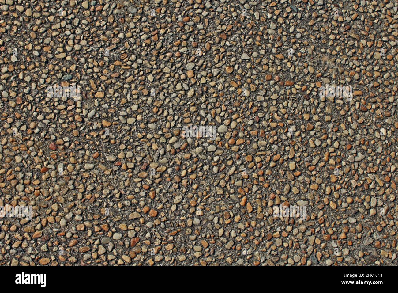 Pebbles concrete stone background hires stock photography and images
