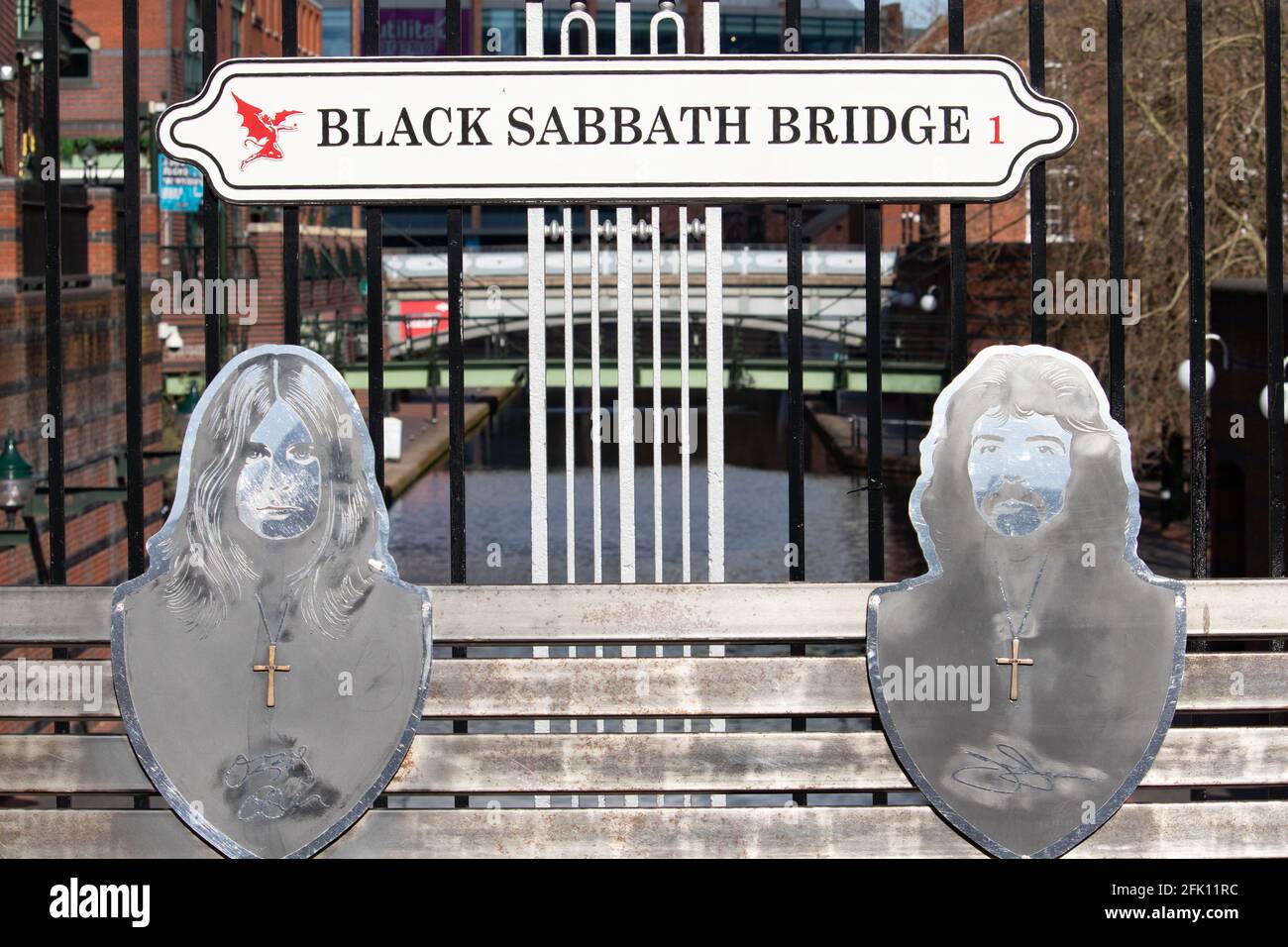 The bridge on Broad Street, Birmingham, renamed the Black Sabbath Bridge after the music rock group Black sabbath who were formed in the City. The bridge has a seat where you can sit alongside members of the band. Stock Photo
