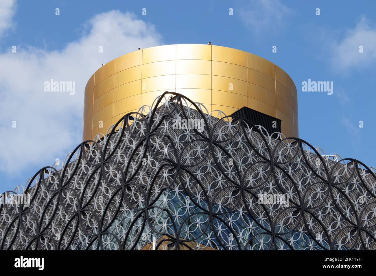 Features of the New Birmingham Library. The gold coloured crown and delicate ringed artwork are unique to the building. Stock Photo