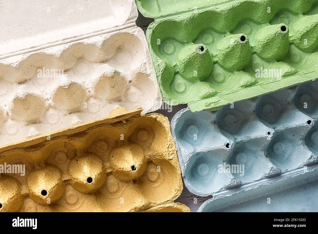 Corrugated packaging for chicken eggs of different colors. Eco-friendly packaging. Copy space Stock Photo