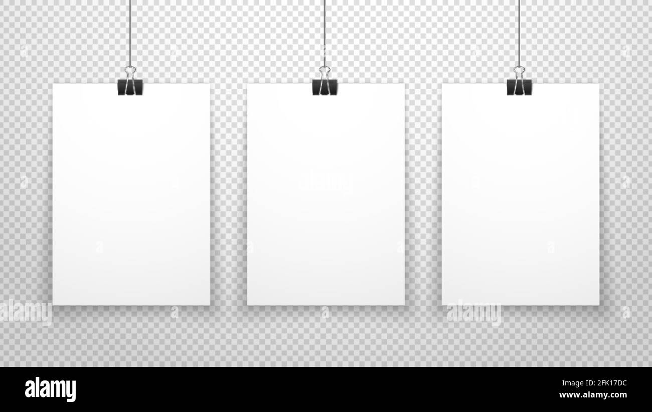 Paper poster. White blanks sheets hanging on wall. Three posters