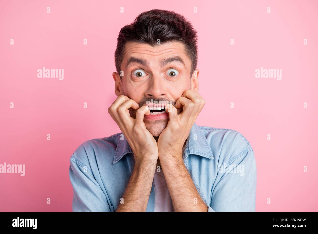 Man scared hands face hi-res stock photography and images - Alamy