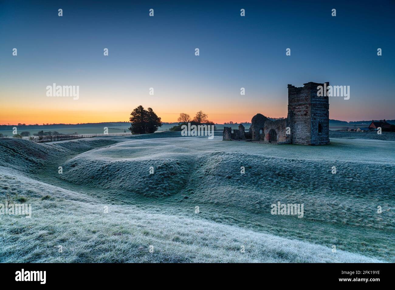 A frosty dawn over the old church at Knowlton near Wimborne in the Dorset countryside Stock Photo