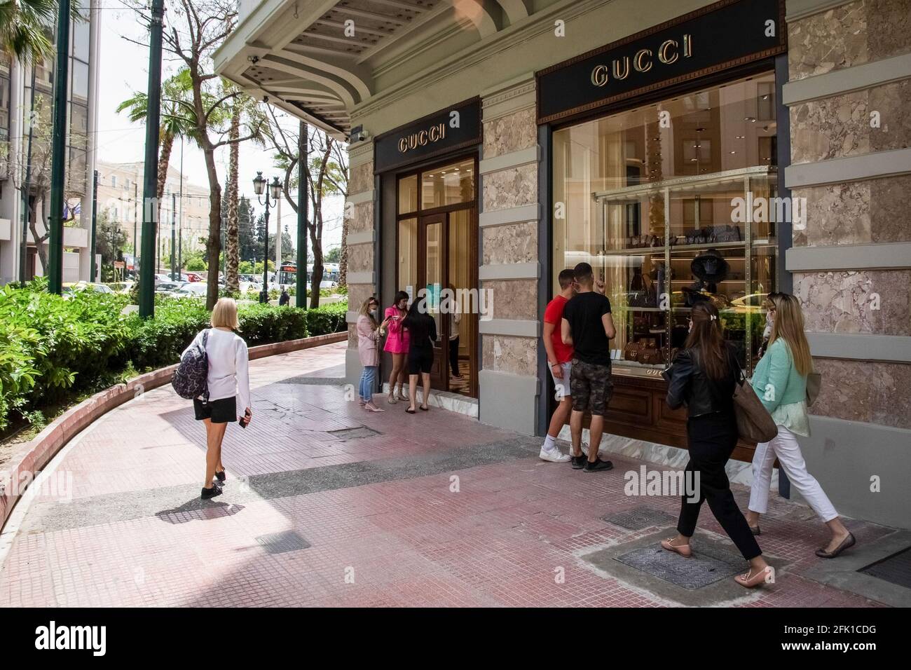 Athens, Greece. 27th Apr, 2021. People seen walking past a Gucci store  close to Syntagma square. Credit: Nikolas Joao Kokovlis/SOPA Images/ZUMA  Wire/Alamy Live News Stock Photo - Alamy