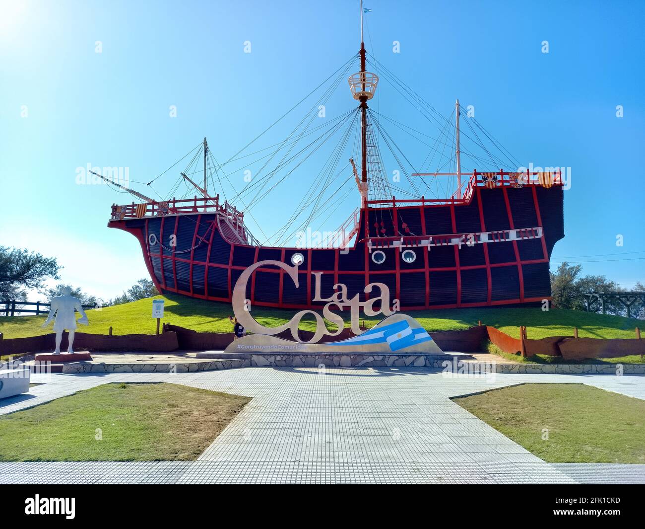 SANTA TERESITA, LA COSTA, BUENOS AIRES, ARGENTINA - Apr 06, 2021: shot of the replica of caravel Santa Maria and monument to Christopher Columbus. Cop Stock Photo