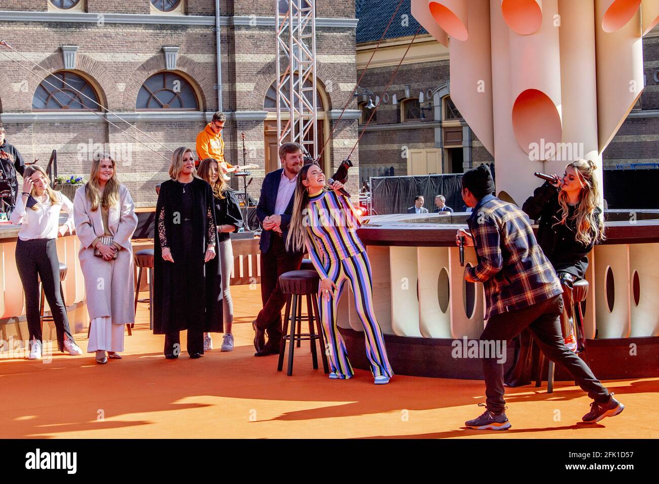 THE HAGUE - Royal Couple King Willem-Alexander and Queen Maxima and Princess Ariane Alexia and Amalia provide a stage for The Streamers' online concert on King's Day The Streamers consist of Guus Meeuwis, Rolf Sanchez, Kraantje Pappie, Suzan & Freek, VanVelzen, Davina Michelle, Paul de Munnik, Typhoon, Thomas Acda, Diggy Dex, Nick & Simon, Maan, Danny Vera, Miss Montreal and Paul de Leeuw. Band manager Frank Lammers is also present. netherlands Photo by Robin Utrecht/ABACAPRESS.COM Stock Photo