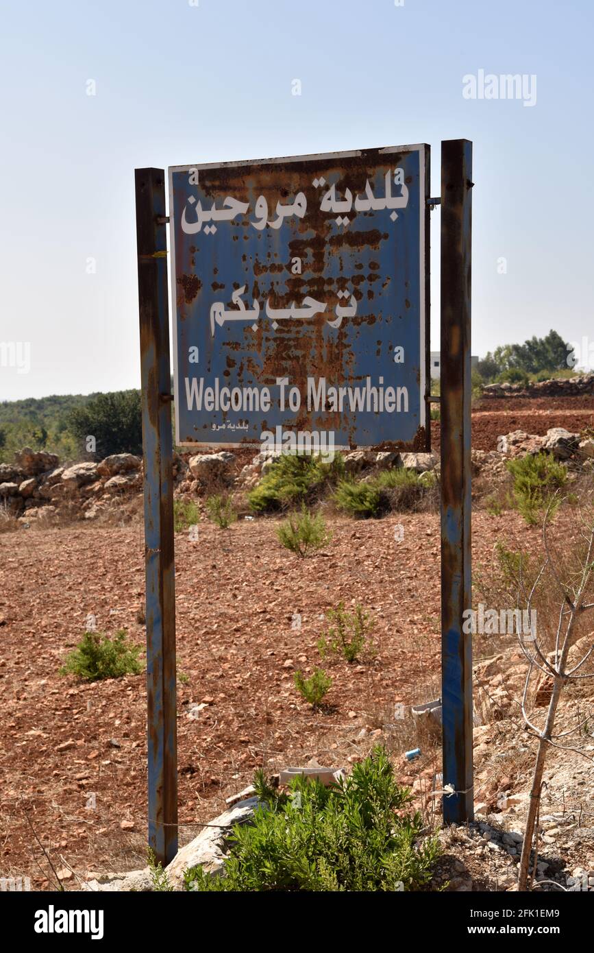 Sign for the town of Marwhein, much targeted during the summer 2006 war between Israel and Hezbollah, southern Lebanon Stock Photo