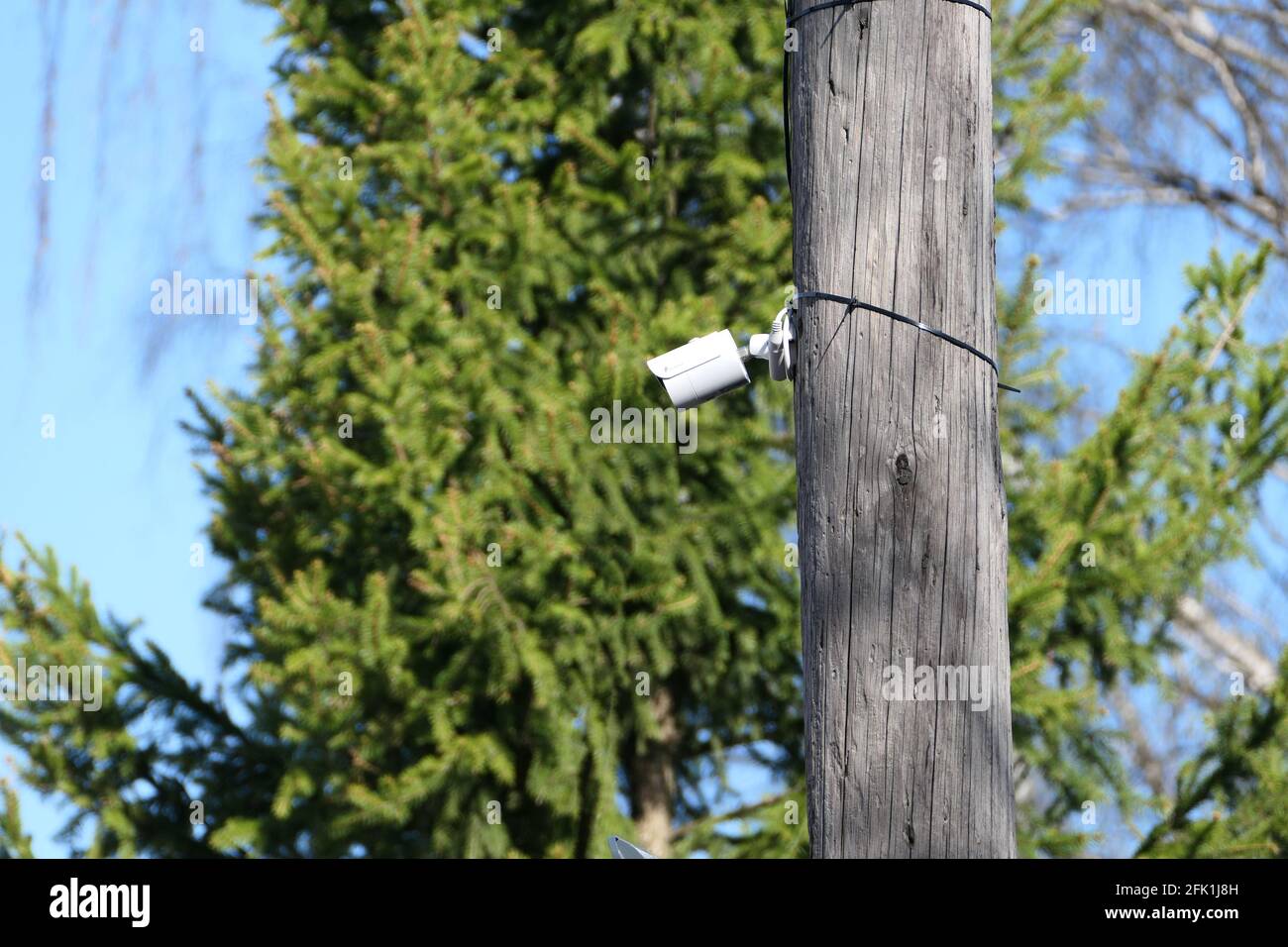 Outdoor security camera on a pole in the open air. Stock Photo