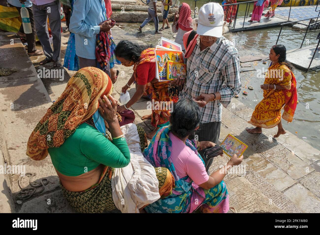 Varanasi, India April 2021 A street vendor selling postcards on a