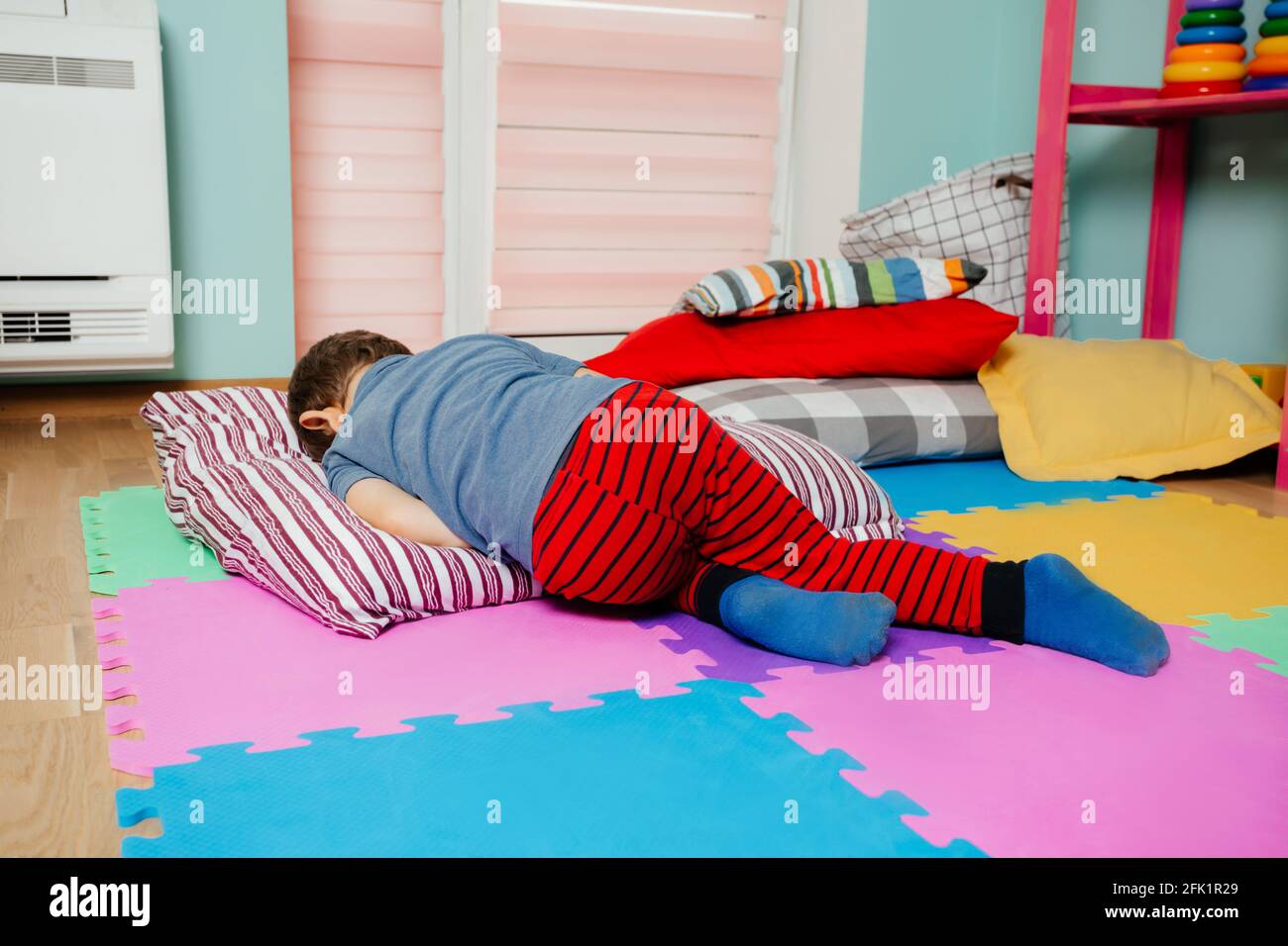 Little boy sleeping while nap time at the kindergarten Stock Photo Alamy