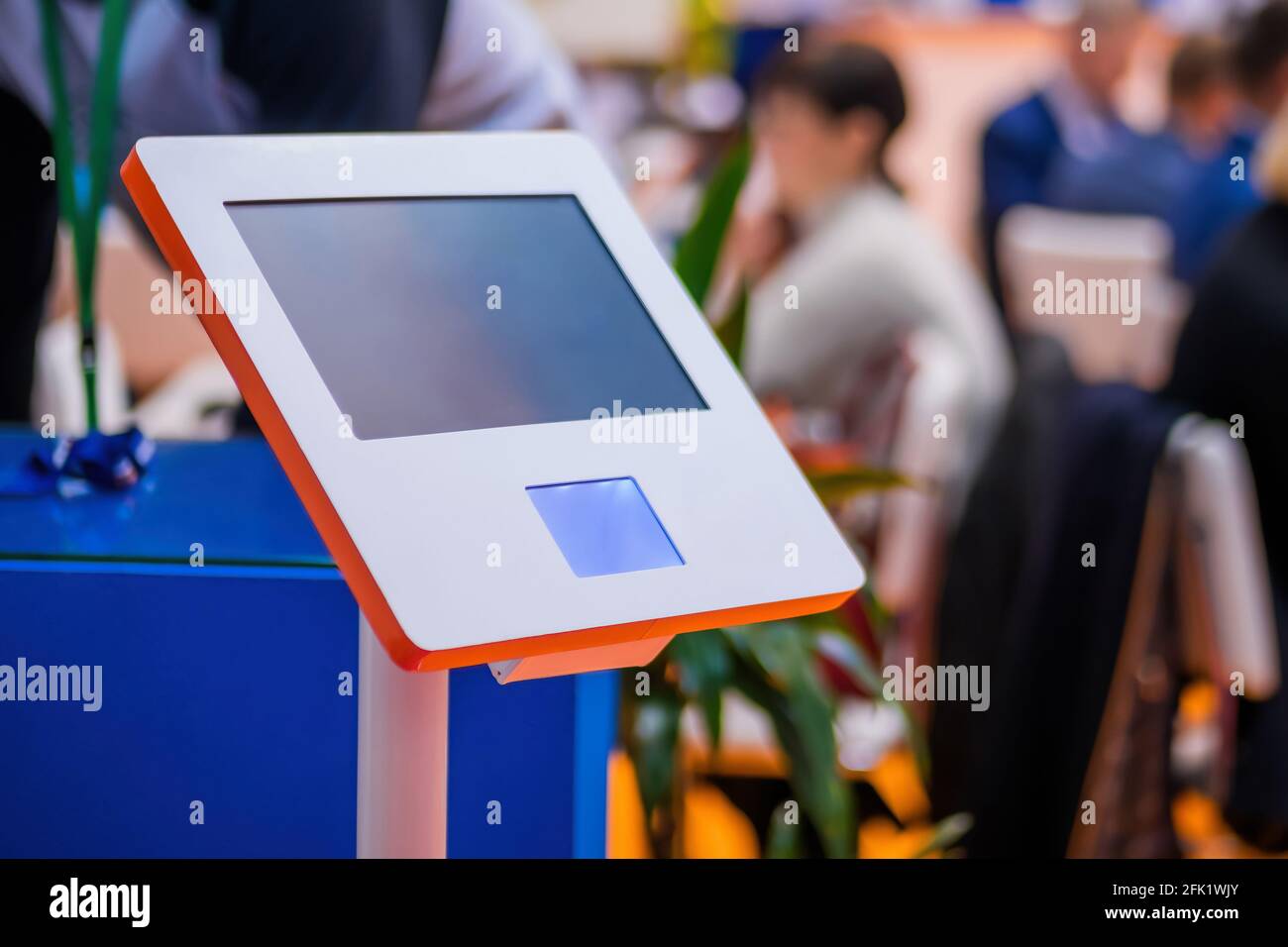 Electronic kiosk with touchscreen display at business exhibition