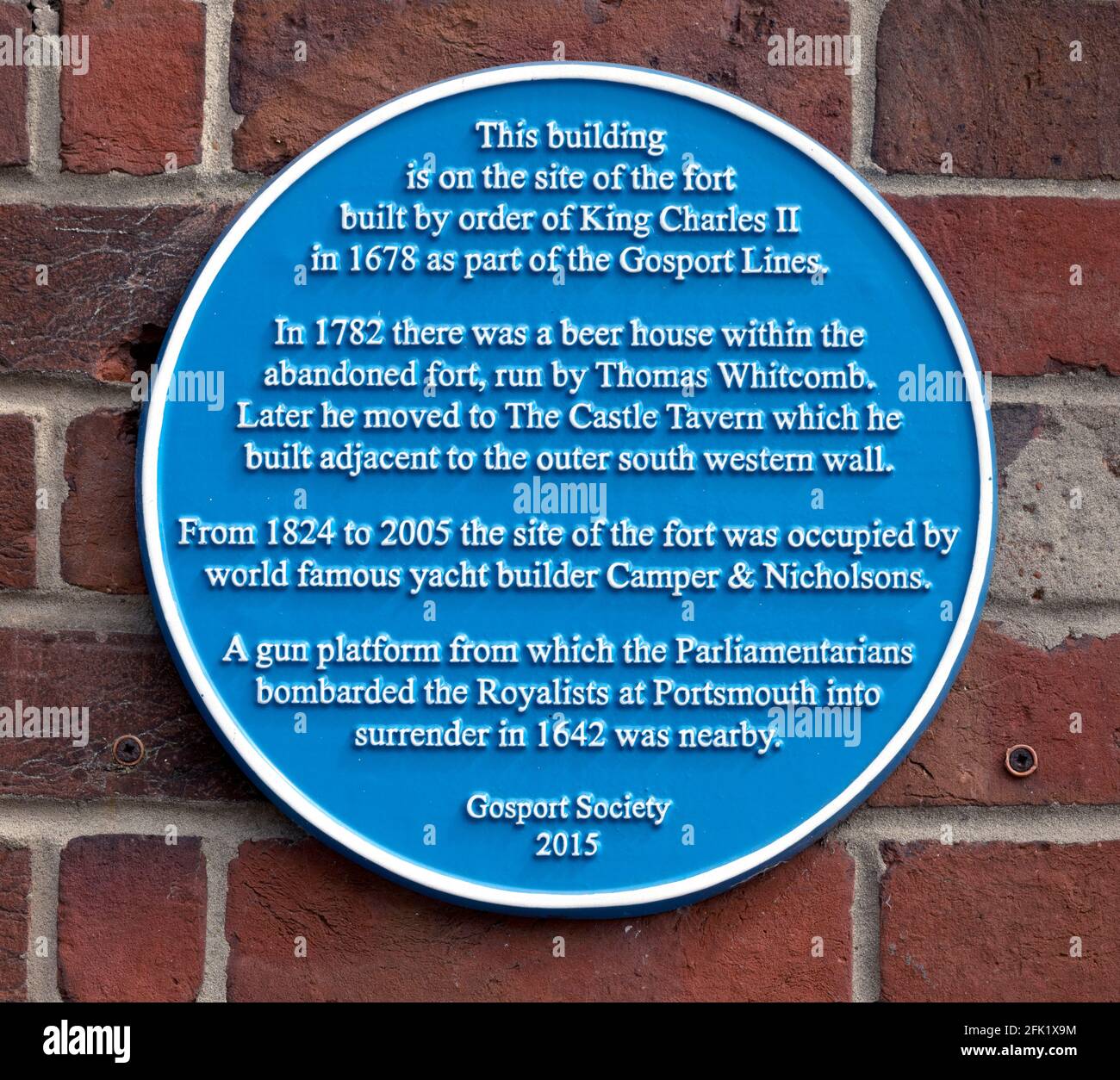 Historic blue plaque of the Gosport Society on the wall of The Castle Tavern public house, Castle Row, Mumby Road, Gosport, Hampshire, England, UK Stock Photo