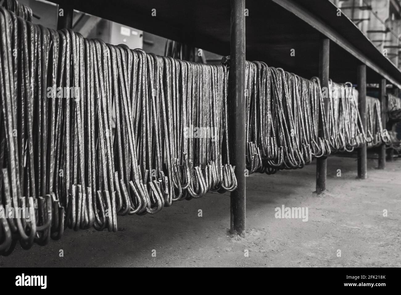 Metal hooks steel equipment in the reinforcement workshop manufacturing at  an industrial enterprise Stock Photo - Alamy