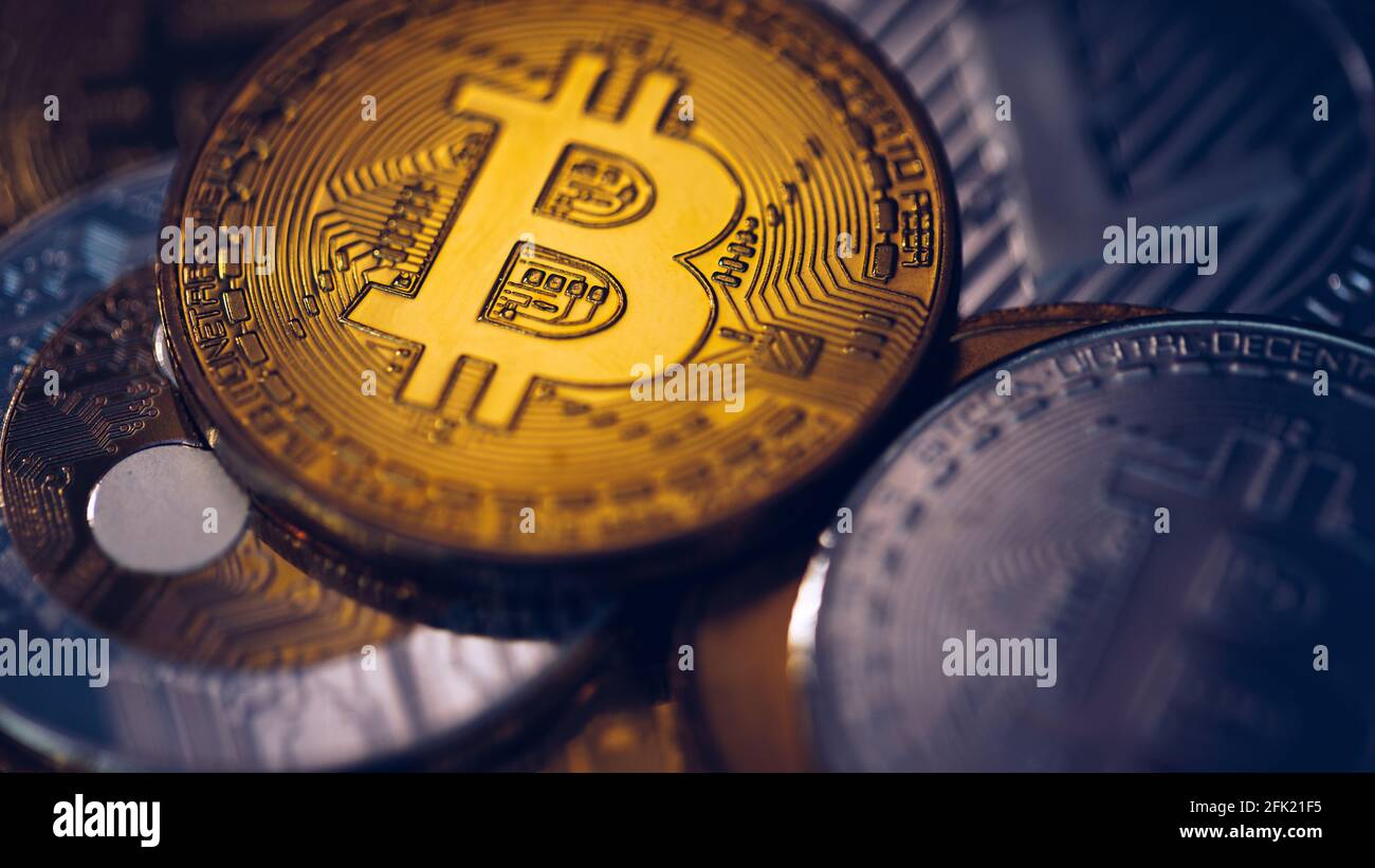 Set of cryptocurrencies with Bitcoin, Etherium, Ripple, Litecoin.  Cryptocurrencys new digital money. Bitcoin on the front as the leader.  Bitcoin as mo Stock Photo - Alamy