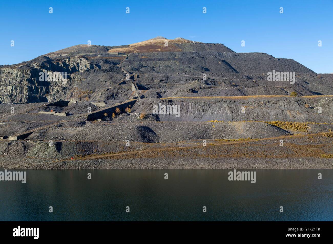 Dinorwic Quarry along the side of the Llyn Peris lake in Snowdonia, North Wales, UK Stock Photo