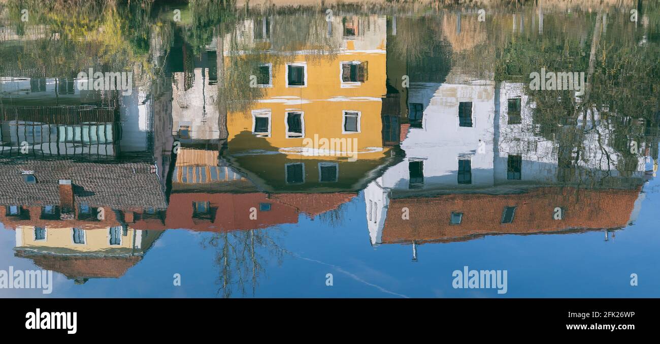 Buildings reflecting in the Krka River, Novo mesto, Slovenia Stock Photo