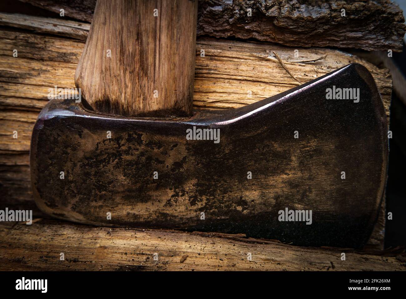 bank tafereel verzekering Dark moody rustic worn axe with chopped wood for fire during cold weather  Stock Photo - Alamy