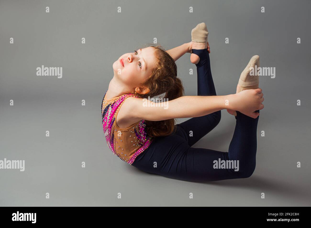 Flexible Cute Little Gymnast Posing Hi-res Stock Photography And Images 