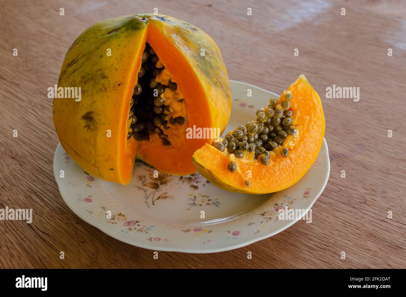 Ripe Papaya In Plate Stock Photo