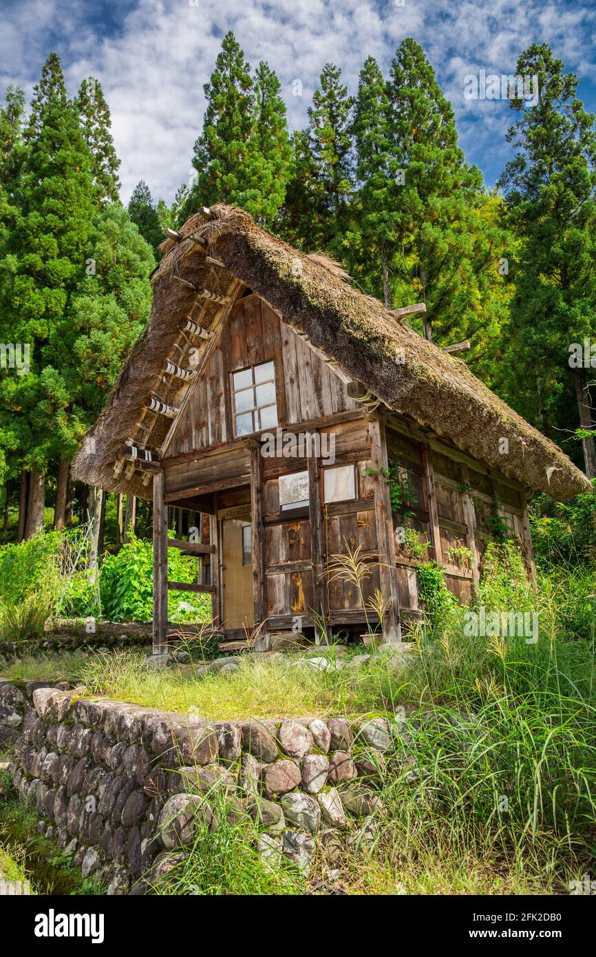 Small traditional Japanese house. Building with a thatched roof