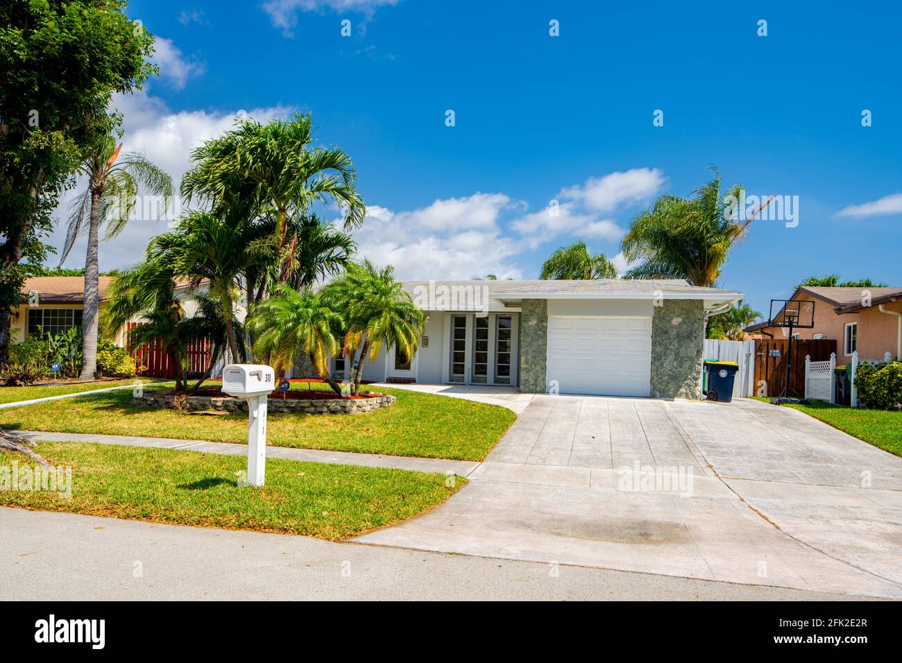 Photo series of single family homes and duplex in residential