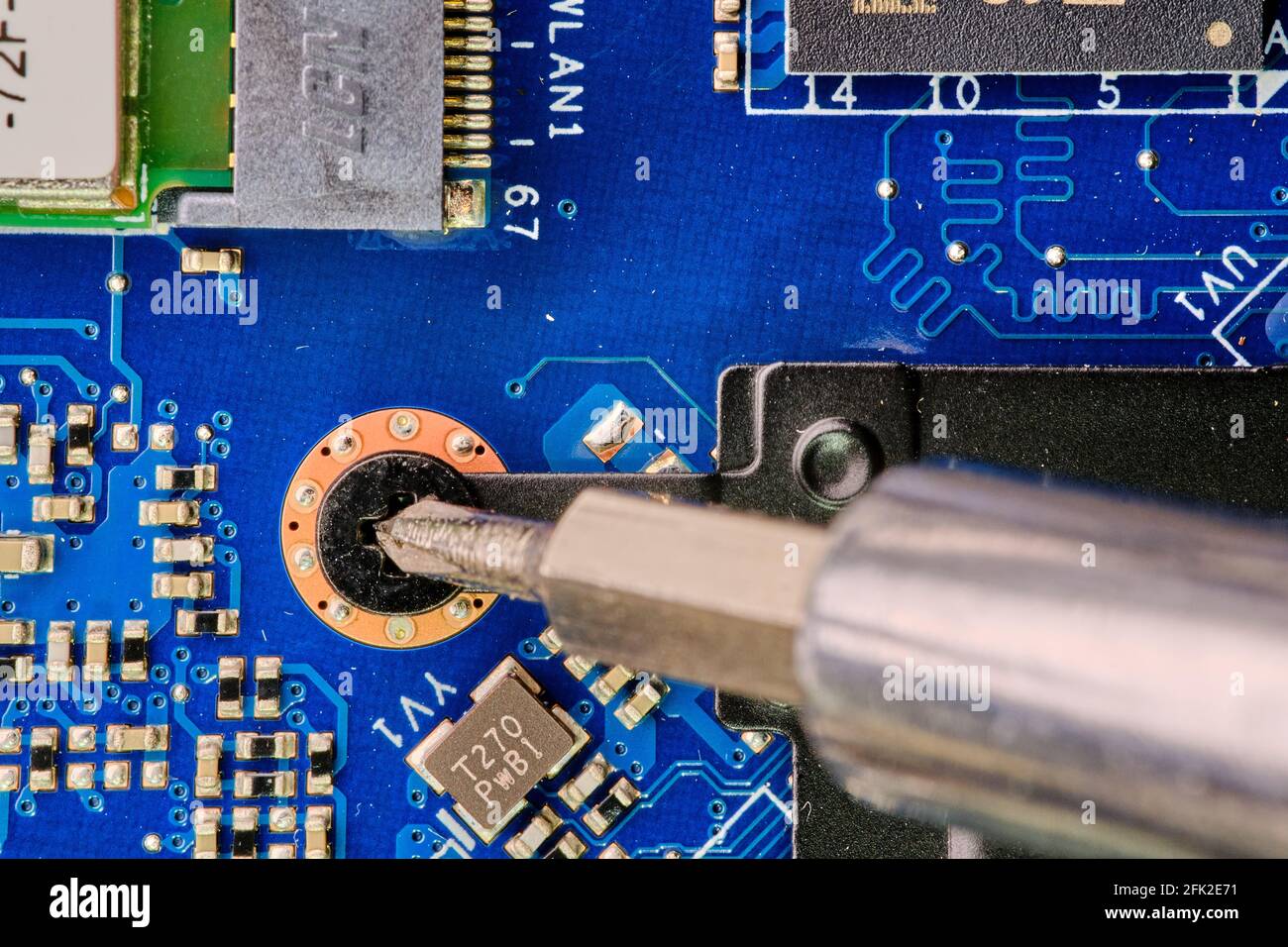 macro and closeup photos about microchips, processors, motherboard, inside an electronic device, a computer, notebook Stock Photo