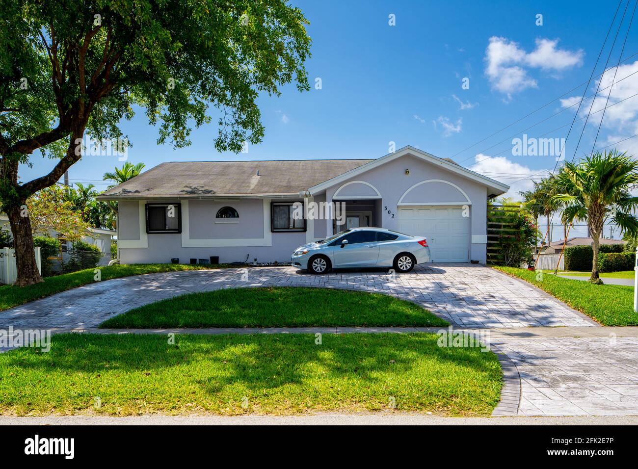 Photo series of single family homes and duplex in residential