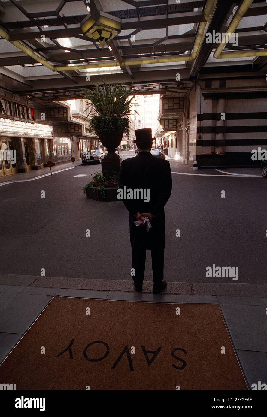 Doorman outside Savoy Hotel London September 1997 Stock Photo Alamy
