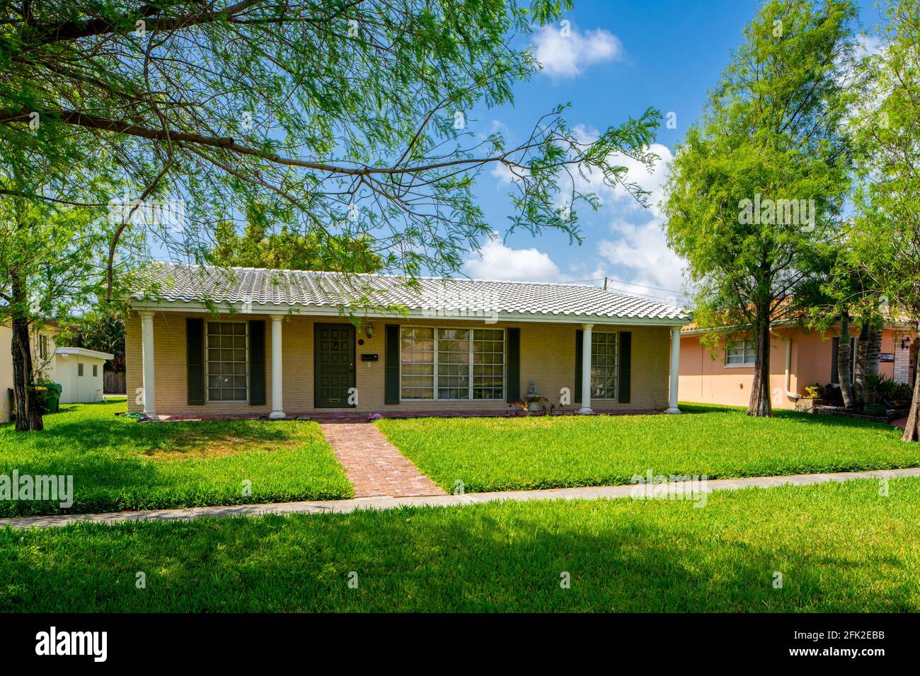 Photo series of single family homes and duplex in residential